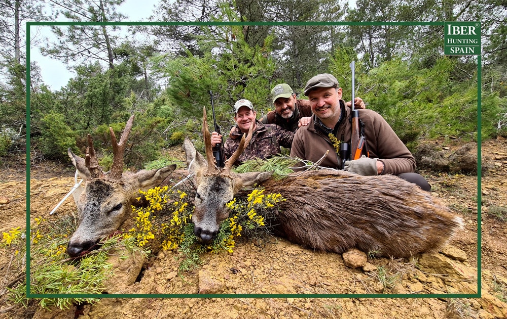 Hunters with their last successful hunt of roe deer in Spain