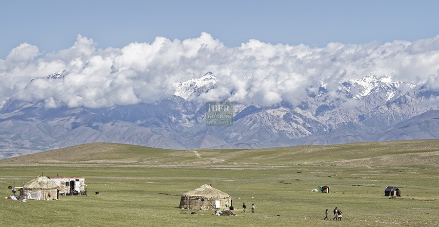 Landscape of mountains and yurts