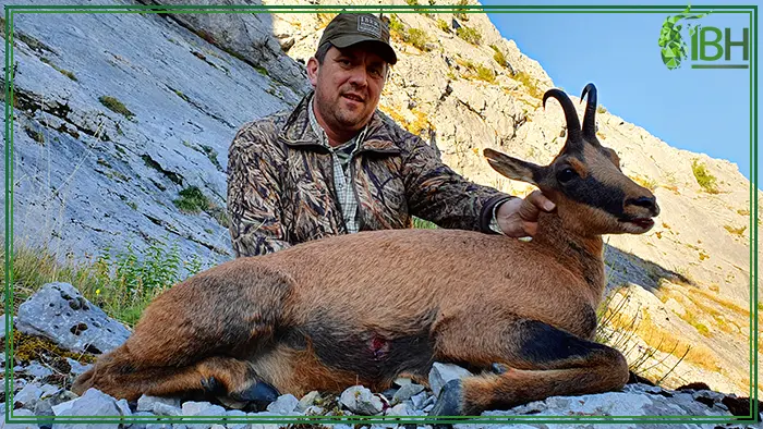 Hunter with his cantabrian chamois hunting trophy