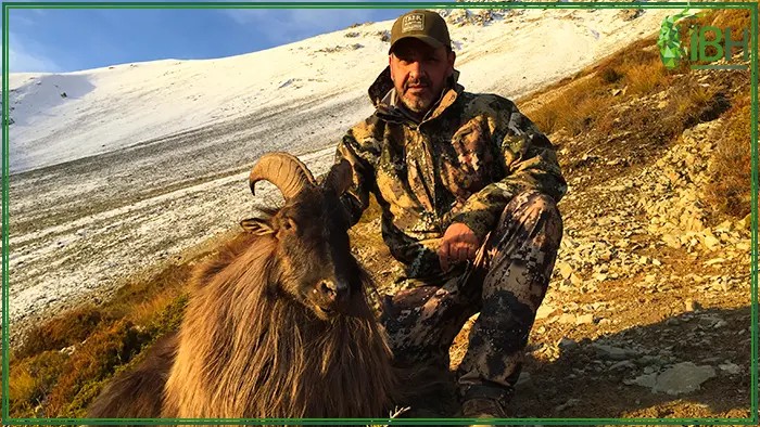 Antonio from IberHunting with his Himalayan tahr hunting in New Zealand