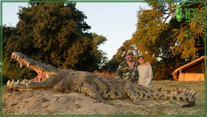 Hunter and his wife with Crocodile hunting trophy in Zambia