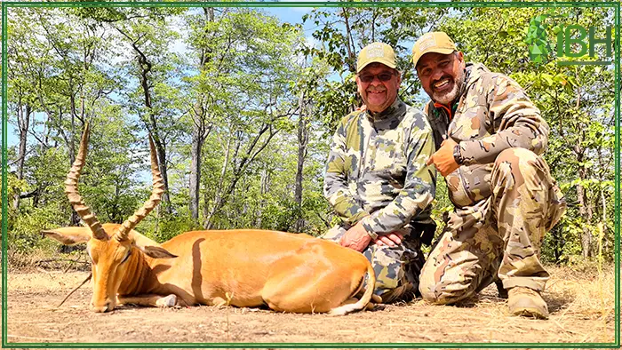 Hunters with an impala hunting trophy in Zambia