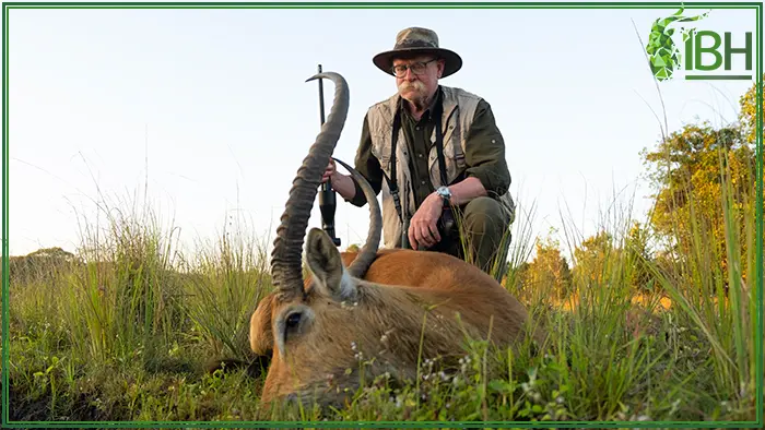 Hunter with his kafue lechwe hunting trophy in Zambia