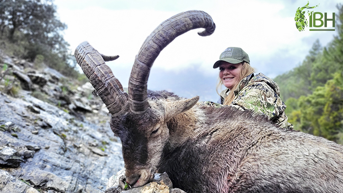 American huntress with her Ronda ibex hunting trophy