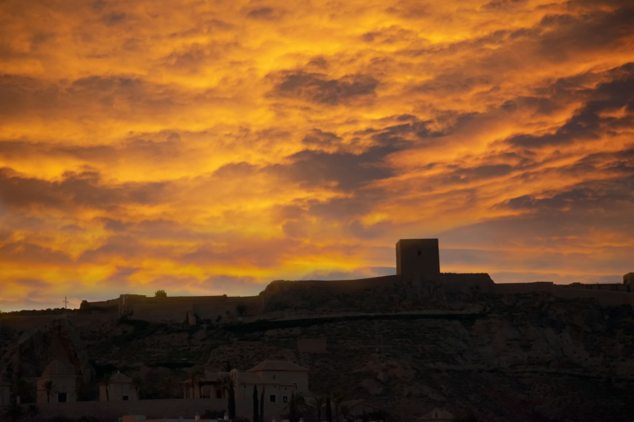 Sunset and the castle of Lorca