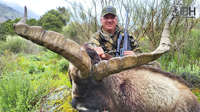 Hunter Joel with his hunting trophy of Gredos ibex in Spain