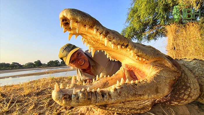 Huntress with her crocodile hunting trophy in Zambia