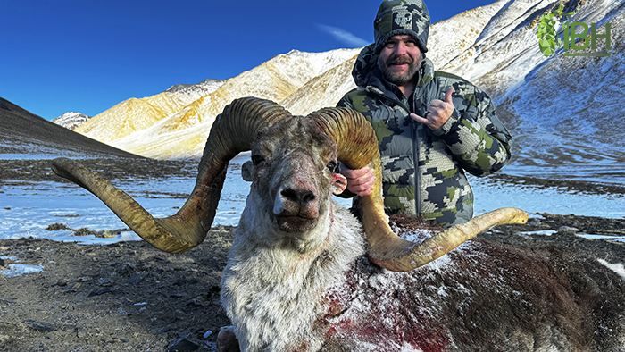 Hunter with a Marco Polo hunting in Tajikistan