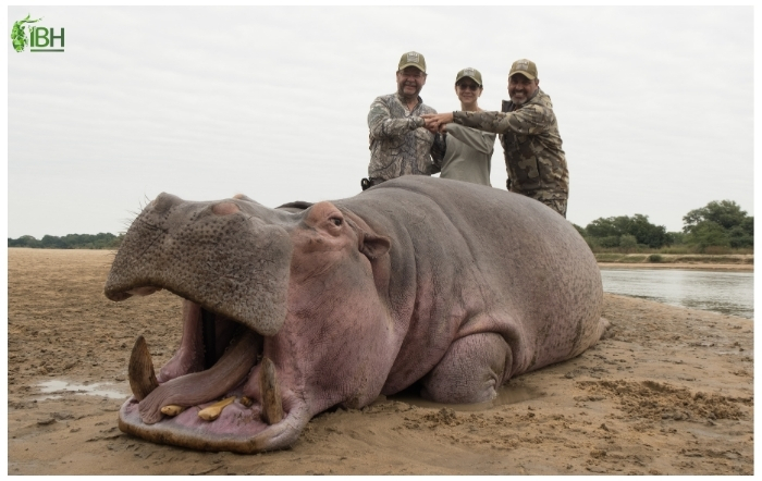 Rusty with his wife and Antonio from IberHunting posing with the Hippo hunting dangerous seven in Africa 