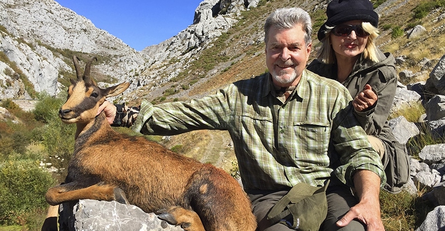 Married couple with a Cantabrian chamois hunting trophy